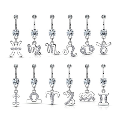 Köldök piercing csillagjegy medállal