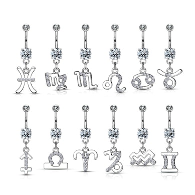 Köldök piercing csillagjegy medállal