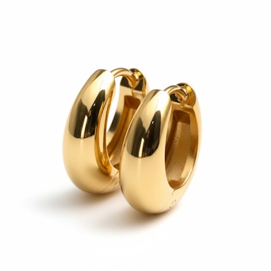 Egy pár tükörfényes, széles kapcsos karika