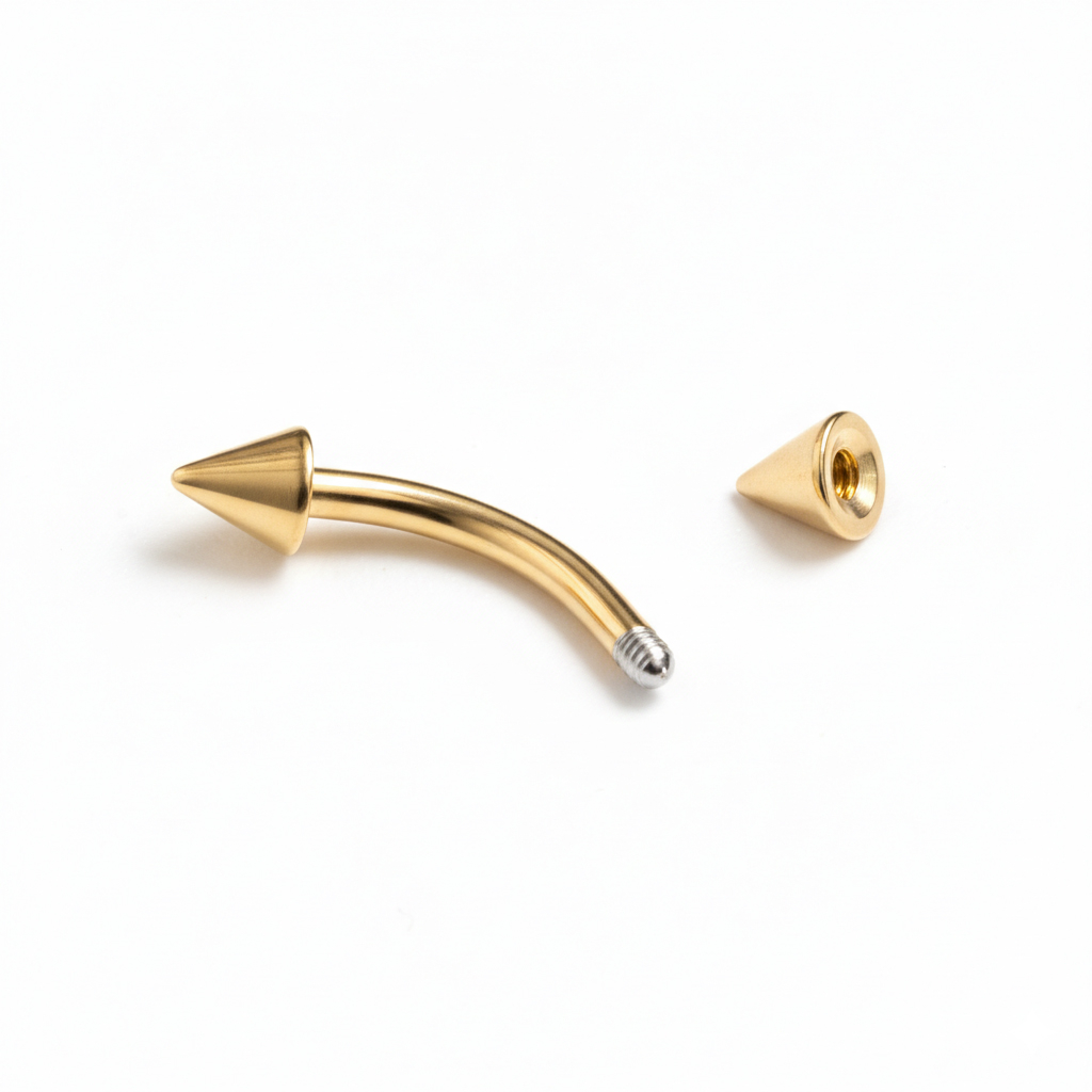 Banán piercing, aranyozott, tüskékkel