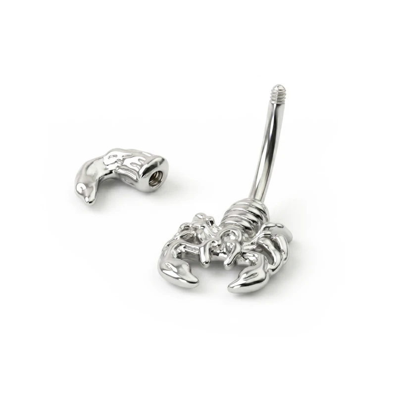 Köldök piercing skorpió dísszel