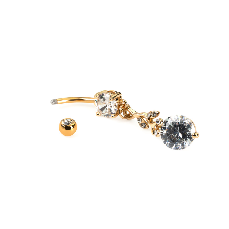 Köldök piercing szerteágazó medállal és kővel